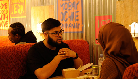 couple sitting in restaurant and having a conversation